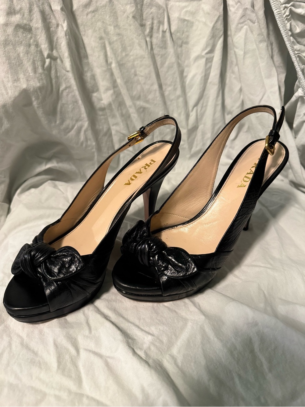 Prada Black Leather Knotted Slingback Heels with Gold Buckle